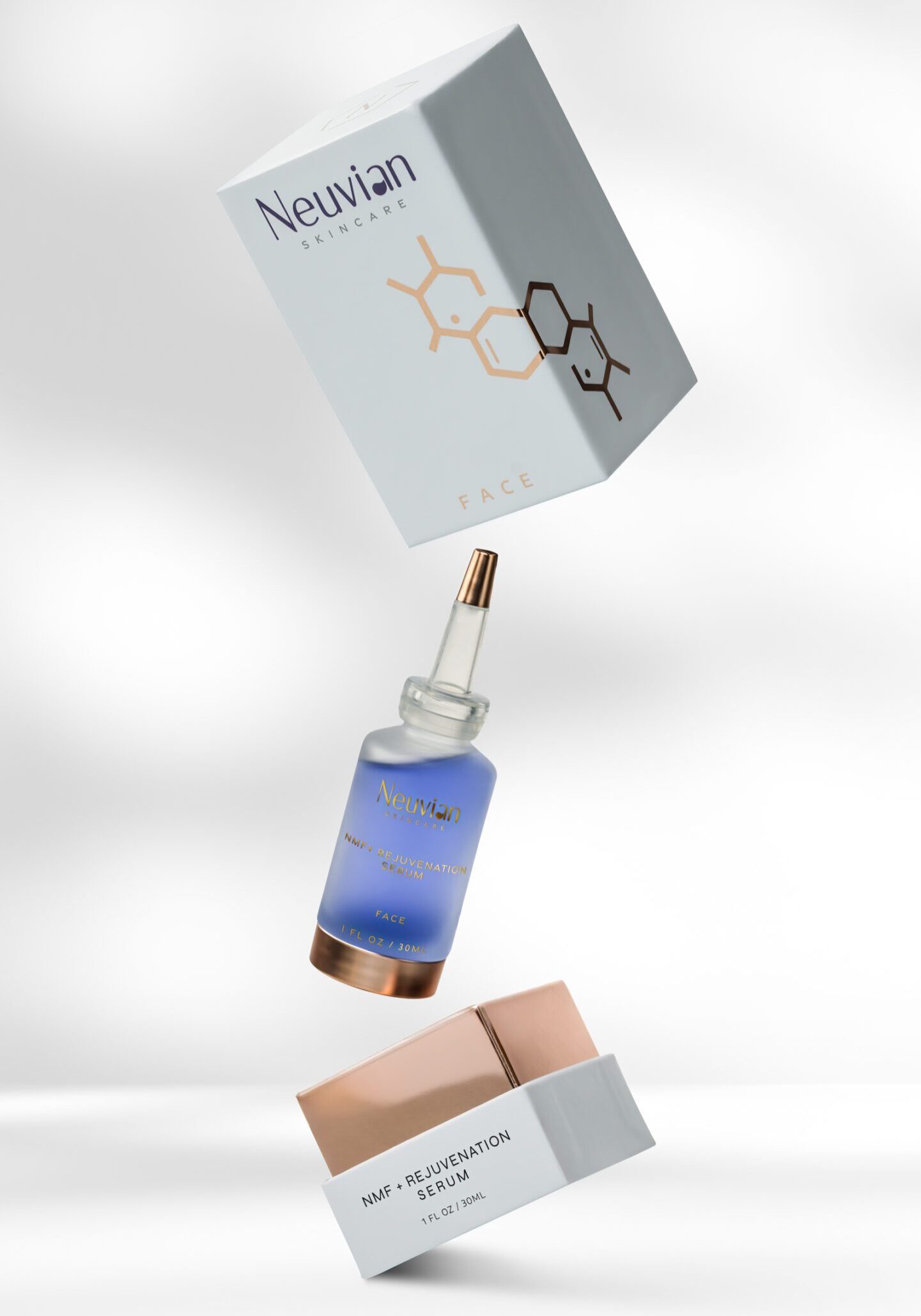 A dropper bottle with blue liquid and its packaging box floating above it.